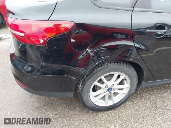 2016 Ford Focus SE with VIN 1FADP3F29GL356629, listed as a IAAI auction lot 41946558 with 86,430 mi miles and . Bid and sale history available at DreamBid. Image 6.