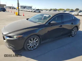 2021 Mazda 3 Premium with VIN JM1BPADL2M1333122, listed as a Copart auction lot 74356134 with 76,762 mi miles and Salvage Title. Bid and sale history available at DreamBid. Image 1.