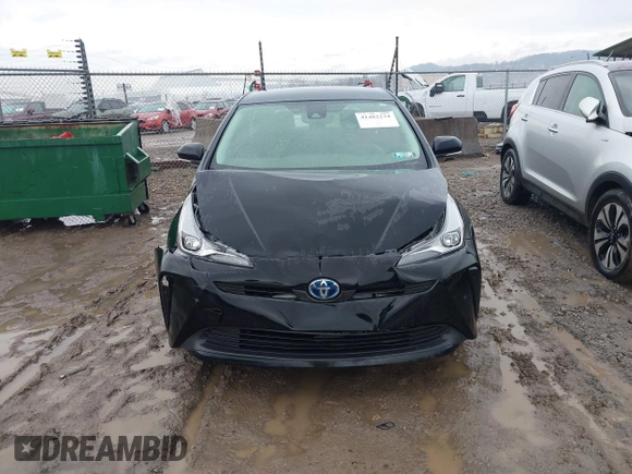 2021 Toyota Prius L Eco with VIN JTDKAMFU5M3145210, listed as a IAAI auction lot 41482234 with 85,600 mi miles and . Bid and sale history available at DreamBid. Image 13.