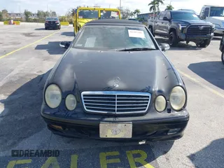 2003 Mercedes-Benz CLK 3.2L with VIN WDBLK65G33T133403, listed as a IAAI auction lot 41297349 with Not Provided miles. Bid and sale history available at carsss.com. Image 6.