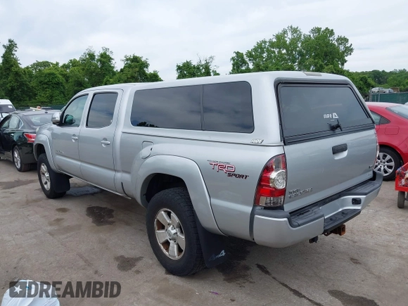 2013 Toyota Tacoma with VIN 3TMMU4FN1DM055477, listed as a IAAI auction lot 42306479 with 191,792 mi miles and . Bid and sale history available at DreamBid. Image 3.