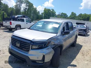 2021 Honda Ridgeline Sport with VIN 5FPYK3F10MB021413, listed as a IAAI auction lot 39847416 with 28,044 mi miles and . Bid and sale history available at DreamBid. Image 2.