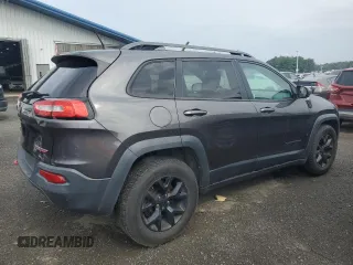 2015 Jeep Cherokee Trailhawk with VIN 1C4PJMBS0FW655167, listed as a Copart auction lot 64597165 with 193,779 mi miles and Clean title. Bid and sale history available at DreamBid. Image 3.