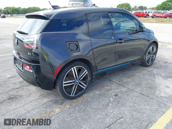 2014 BMW i3 z VIN WBY1Z4C56EVX63285, wystawiony jako IAAI lot #41672245 z przebiegiem 70 229 mil mil oraz . Historia ofert i sprzedaży dostępna na DreamBid. Obrazek 4.