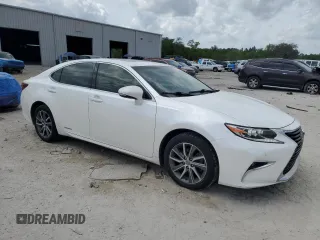 2017 Lexus ES 300h with VIN JTHBW1GG3H2138985, listed as a Copart auction lot 52014955 with 126,653 mi miles and Salvage Title. Bid and sale history available at DreamBid. Image 4.