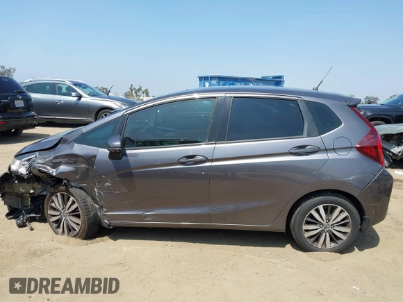 2015 Honda Fit EX-L with VIN 3HGGK5H84FM764084, listed as a IAAI auction lot 42321647 with 82,819 mi miles and . Bid and sale history available at DreamBid. Image 14.