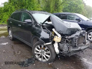 2014 Mazda CX-9 Grand Touring z VIN JM3TB3DV2E0440928, wystawiony jako IAAI lot #42263826 z przebiegiem 130 102 mil mil oraz . Historia ofert i sprzedaży dostępna na DreamBid. Obrazek 1.