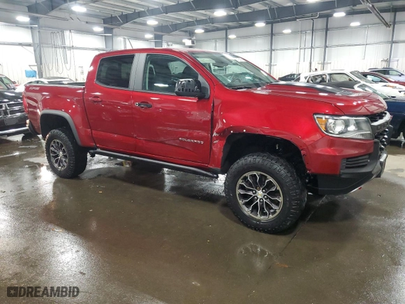 2021 Chevrolet Colorado 4WD ZR2 with VIN 1GCGTEEN7M1111894, listed as a Copart auction lot 85169404 with 56,965 mi miles and Salvage Title. Bid and sale history available at carsss.com. Image 4.