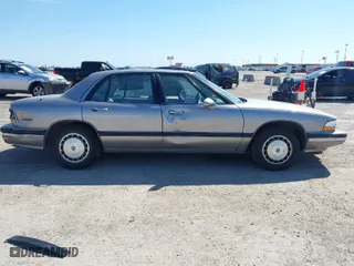 1995 Buick LeSabre Custom with VIN 1G4HP52L5SH487893, listed as a IAAI auction lot 41680378 with 121,742 mi miles. Bid and sale history available at carsss.com. Image 6.