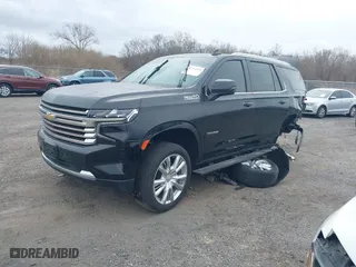 2022 Chevrolet Tahoe High Country with VIN 1GNSKTKL8NR241374, listed as a IAAI auction lot 41724119 with 48,316 mi miles. Bid and sale history available at carsss.com. Image 2.