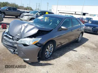 2015 Toyota Camry XLE with VIN 4T1BF1FK0FU952421, listed as a IAAI auction lot 41714622 with 125,553 mi miles and . Bid and sale history available at DreamBid. Image 2.