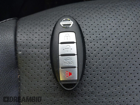 2013 Nissan Sentra SR z VIN 3N1AB7AP8DL734903, wystawiony jako IAAI lot #41165284 z przebiegiem 143 617 mil mil oraz . Historia ofert i sprzedaży dostępna na DreamBid. Obrazek 11.