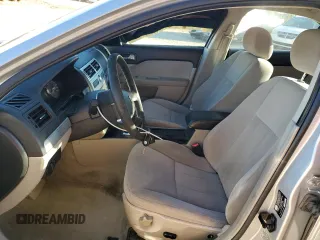 2006 Mercury Milan with VIN 3MEHM07126R655886, listed as a Copart auction lot 82015354 with 128,341 mi miles and Salvage title. Bid and sale history available at DreamBid. Image 7.