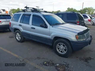 2004 Jeep Grand Cherokee Laredo z VIN 1J4GW48S14C431892, wystawiony jako IAAI lot #42265941 z przebiegiem 141 964 mil mil oraz . Historia ofert i sprzedaży dostępna na DreamBid. Obrazek 1.