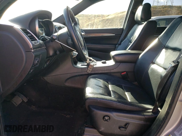 2018 Jeep Grand Cherokee Sterling Edition with VIN 1C4RJFBG4JC128226, listed as a Copart auction lot 52759825 with 134,882 mi miles and Salvage Title. Bid and sale history available at carsss.com. Image 7.