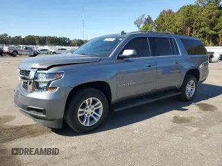 2020 Chevrolet Suburban LS with VIN 1GNSCGKC7LR185221, listed as a Copart auction lot 77254654 with 77,881 mi miles and Salvage title. Bid and sale history available at DreamBid. Image 1.