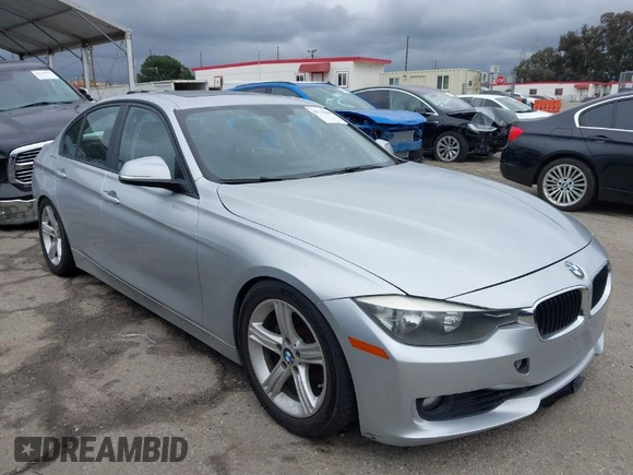 2014 BMW 3 Series 328i with VIN WBA3C1C53EK109613, listed as a IAAI auction lot 41713060 with 141,240 mi miles. Bid and sale history available at carsss.com. Image 1.