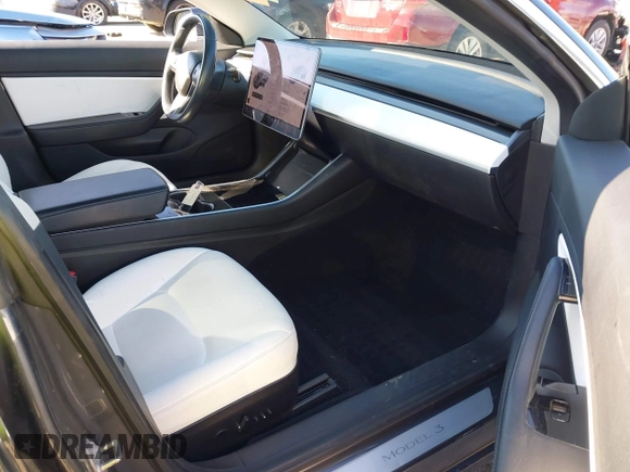 2018 Tesla Model 3 Long Range Battery with VIN 5YJ3E1EB6JF122167, listed as a IAAI auction lot 41761710 with 76,199 mi miles and . Bid and sale history available at DreamBid. Image 5.