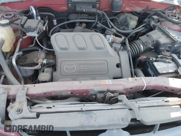 2003 Mazda Tribute ES with VIN 4F2CZ96183KM35719, listed as a IAAI auction lot 40611399 with 136,374 mi miles. Bid and sale history available at carsss.com. Image 10.