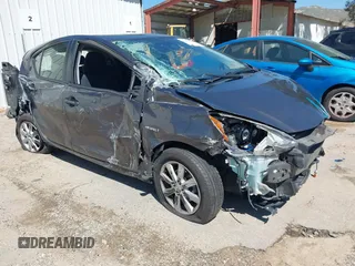 2017 Toyota Prius One z VIN JTDKDTB37H1596039, wystawiony jako IAAI lot #41868009 z przebiegiem 124 585 mil mil oraz . Historia ofert i sprzedaży dostępna na DreamBid. Obrazek 1.