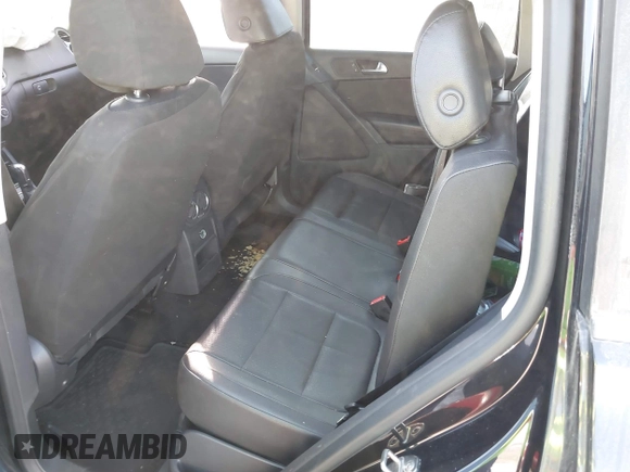 2012 Volkswagen Tiguan SE with VIN WVGAV7AX8CW565863, listed as a IAAI auction lot 41528643 with 122,569 mi miles and . Bid and sale history available at DreamBid. Image 8.