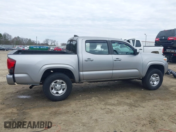 2018 Toyota Tacoma SR with VIN 3TMCZ5AN4JM130307, listed as a IAAI auction lot 41541477 with 74,369 mi miles and . Bid and sale history available at DreamBid. Image 14.