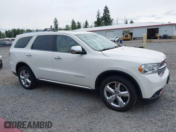 2012 Dodge Durango Citadel with VIN 1C4RDJEG8CC336957, listed as a IAAI auction lot 42309501 with 196,610 mi miles and . Bid and sale history available at DreamBid. Image 13.