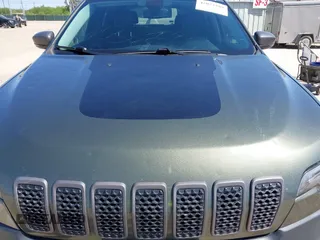 2019 Jeep Cherokee Trailhawk Elite with VIN 1C4PJMBN7KD287506, listed as a IAAI auction lot 42072589 with 108,034 mi miles and . Bid and sale history available at DreamBid. Image 6.