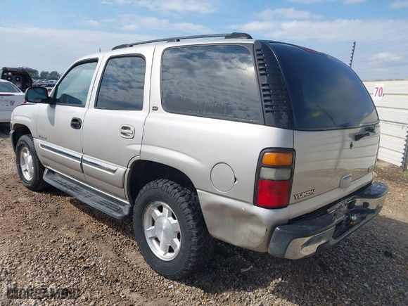 2005 GMC Yukon SLT with VIN 1GKEC13T05R127797, listed as a IAAI auction lot 41540673 with 241,617 mi miles. Bid and sale history available at carsss.com. Image 3.