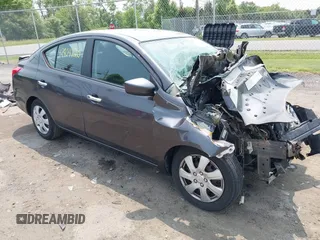 2015 Nissan Versa SV with VIN 3N1CN7AP4FL803301, listed as a IAAI auction lot 42404120 with 83,840 mi miles and . Bid and sale history available at DreamBid. Image 1.
