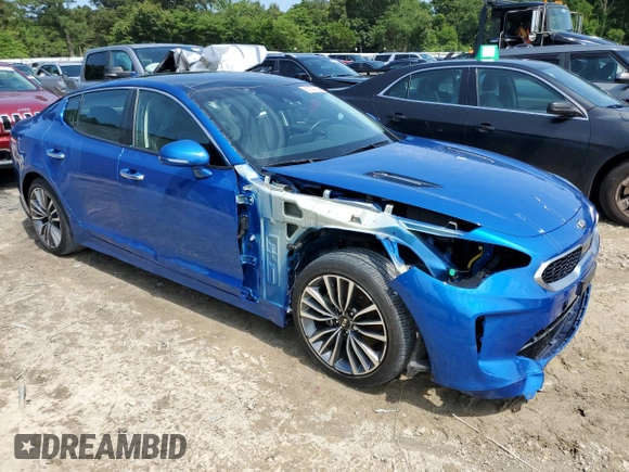 2018 Kia Stinger Premium with VIN KNAE25LA9J6037500, listed as a Copart auction lot 63330054 with 31,234 mi miles and Salvage Title. Bid and sale history available at DreamBid. Image 4.