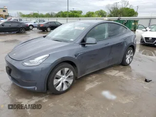 2023 Tesla Model Y Long Range with VIN 7SAYGDEE3PA151887, listed as a Copart auction lot 51459495 with 15,562 mi miles and Salvage Title. Bid and sale history available at DreamBid. Image 1.