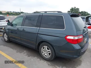 2005 Honda Odyssey EX-L with VIN 5FNRL38775B110232, listed as a IAAI auction lot 42301513 with 277,389 mi miles and . Bid and sale history available at DreamBid. Image 3.