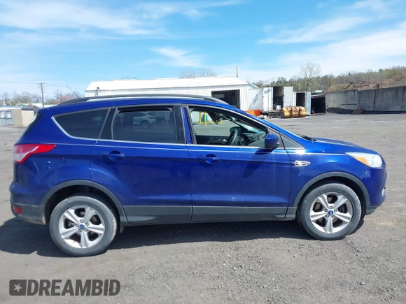 2013 Ford Escape SE with VIN 1FMCU9G95DUA76544, listed as a IAAI auction lot 42080309 with 167,821 mi miles and . Bid and sale history available at DreamBid. Image 13.