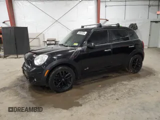 2013 MINI Countryman S ALL4 with VIN WMWZC5C55DWM15639, listed as a Copart auction lot 50991075 with 120,098 mi miles and Salvage Title. Bid and sale history available at DreamBid. Image 1.