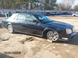 2000 Cadillac DeVille DHS z VIN 1G6KE57Y3YU338809, wystawiony jako IAAI lot #41473488 z przebiegiem 178 408 mil mil oraz . Historia ofert i sprzedaży dostępna na DreamBid. Obrazek 1.