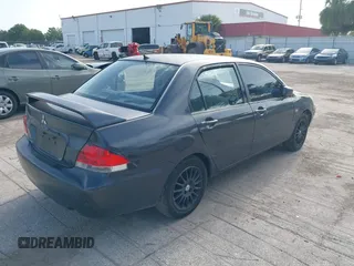 2004 Mitsubishi Lancer ES with VIN JA3AJ26E64U016149, listed as a IAAI auction lot 42438863 with 203,618 mi miles and . Bid and sale history available at DreamBid. Image 4.