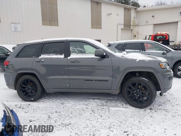 2020 Jeep Grand Cherokee Laredo E with VIN 1C4RJFAG9LC291300, listed as a IAAI auction lot 41315443 with 29,979 mi miles and . Bid and sale history available at DreamBid. Image 13.