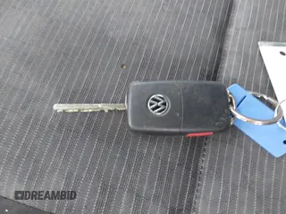 2013 Volkswagen Tiguan SE z VIN WVGAV3AX4DW607441, wystawiony jako IAAI lot #42173141 z przebiegiem 113 186 mil mil oraz . Historia ofert i sprzedaży dostępna na DreamBid. Obrazek 11.