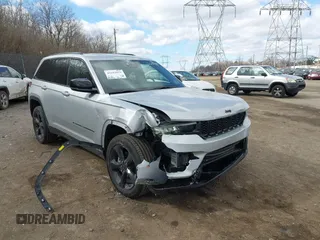 2023 Jeep Grand Cherokee Laredo with VIN 1C4RJHAG2PC660418, listed as a IAAI auction lot 41693879 with 4,295 mi miles and . Bid and sale history available at DreamBid. Image 6.