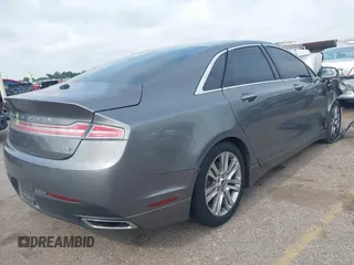 2014 Lincoln MKZ z VIN 3LN6L2GK3ER807586, wystawiony jako IAAI lot #42426125 z przebiegiem 198 281 mil mil oraz . Historia ofert i sprzedaży dostępna na DreamBid. Obrazek 4.