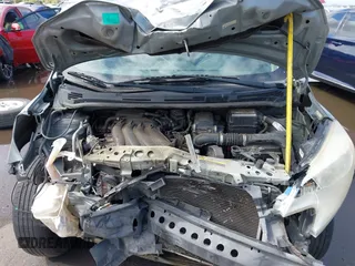 2014 Nissan Note S Plus z VIN 3N1CE2CP7EL423853, wystawiony jako IAAI lot #42402127 z przebiegiem 199 799 mil mil oraz . Historia ofert i sprzedaży dostępna na DreamBid. Obrazek 10.