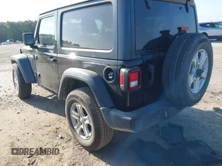2021 Jeep Wrangler Sport S with VIN 1C4HJXAG6MW744998, listed as a IAAI auction lot 42170965 with 59,373 mi miles and . Bid and sale history available at DreamBid. Image 3.