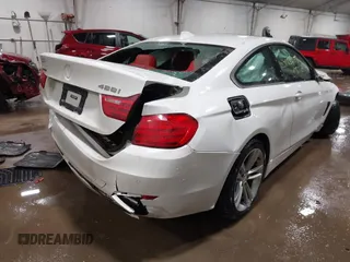 2015 BMW 4 Series 428i xDrive z VIN WBA3N9C52FK246245, wystawiony jako IAAI lot #41650714 z przebiegiem 142 776 mil mil oraz . Historia ofert i sprzedaży dostępna na DreamBid. Obrazek 4.