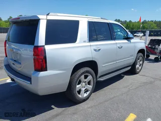2015 Chevrolet Tahoe LTZ with VIN 1GNSCCKC3FR202934, listed as a IAAI auction lot 41995474 with 258,186 mi miles. Bid and sale history available at carsss.com. Image 4.