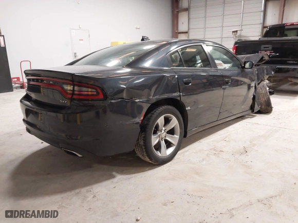 2016 Dodge Charger SXT with VIN 2C3CDXHG3GH317843, listed as a IAAI auction lot 41583342 with 114,539 mi miles. Bid and sale history available at carsss.com. Image 4.