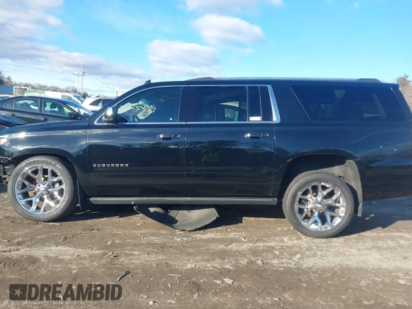 2019 Chevrolet Suburban Premier with VIN 1GNSKJKCXKR111502, listed as a IAAI auction lot 41075435 with 134,555 mi miles and . Bid and sale history available at DreamBid. Image 14.
