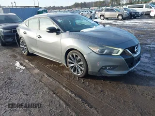 2016 Nissan Maxima SV z VIN 1N4AA6APXGC415244, wystawiony jako IAAI lot #41323902 z przebiegiem 119 354 mil mil oraz . Historia ofert i sprzedaży dostępna na DreamBid. Obrazek 1.