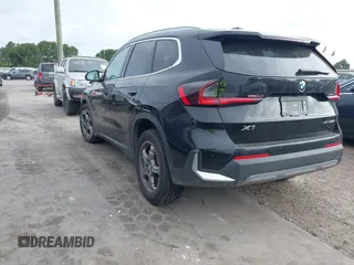2023 BMW X1 xDrive28i with VIN WBX73EF04P5W37659, listed as a IAAI auction lot 42167511 with 36,820 mi miles and . Bid and sale history available at DreamBid. Image 3.
