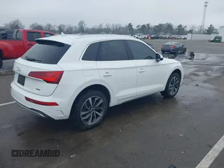 2021 Audi Q5 Premium Plus z VIN WA1BAAFY8M2077292, wystawiony jako IAAI lot #41663216 z przebiegiem 35 378 mil mil oraz . Historia ofert i sprzedaży dostępna na DreamBid. Obrazek 4.